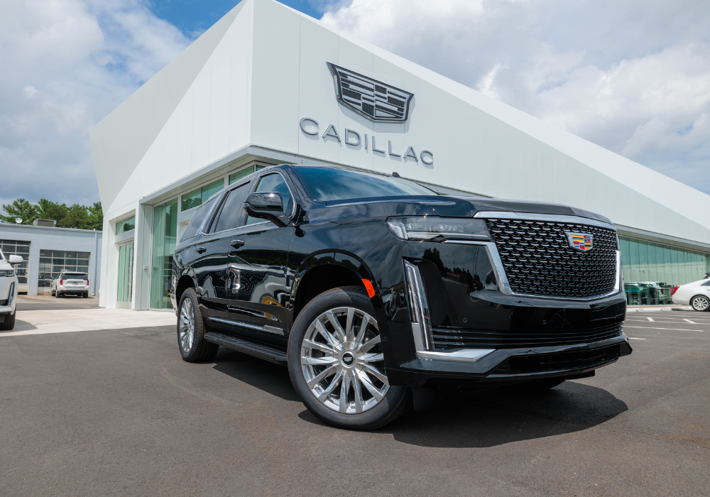 Cadillac SUV parked outside the Flow Cadillac dealership in Winston-Salem